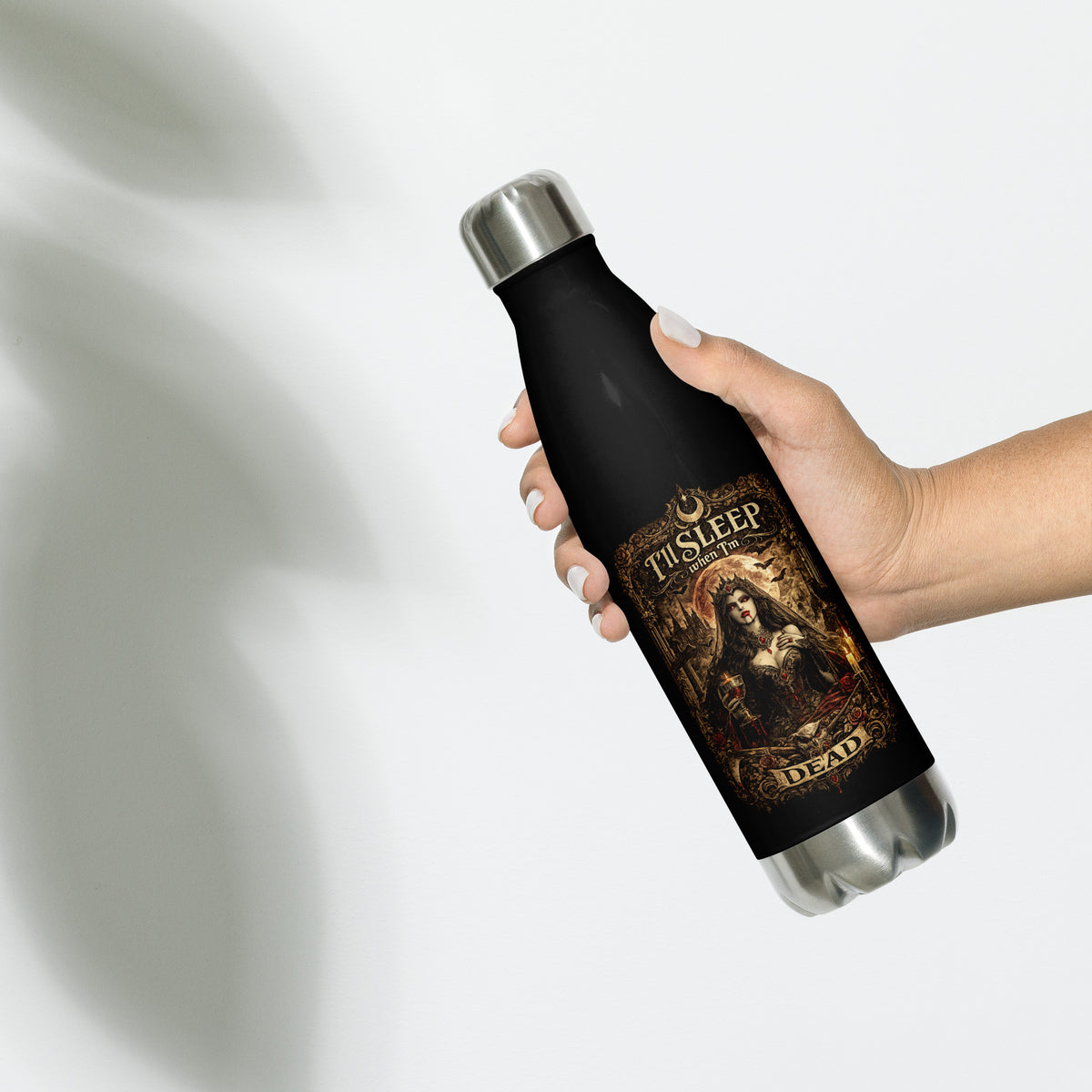 Victorian gothic vampire artwork featuring moonlit architecture, ravens, candles, roses, skulls, and the slogan "I'll Sleep When I'm Dead" displayed on a black stainless steel water bottle.